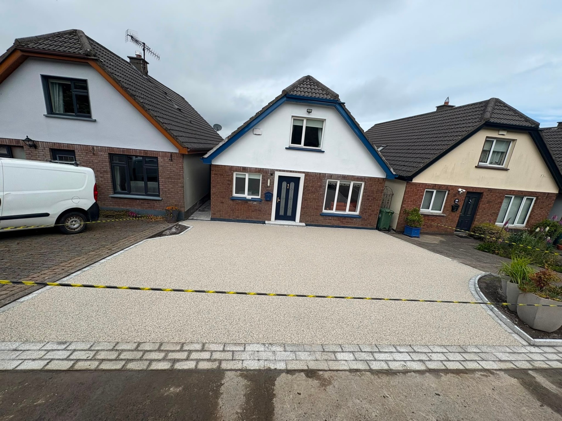 Resin-bound driveway with clean edging on a Dublin suburban home