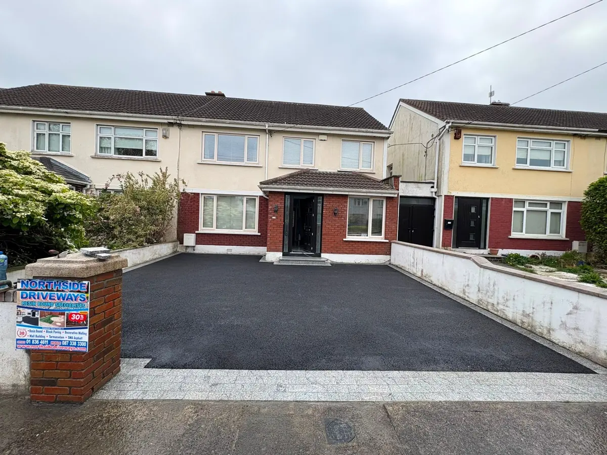 Freshly laid tarmac driveway with kerbed edging, North Dublin home