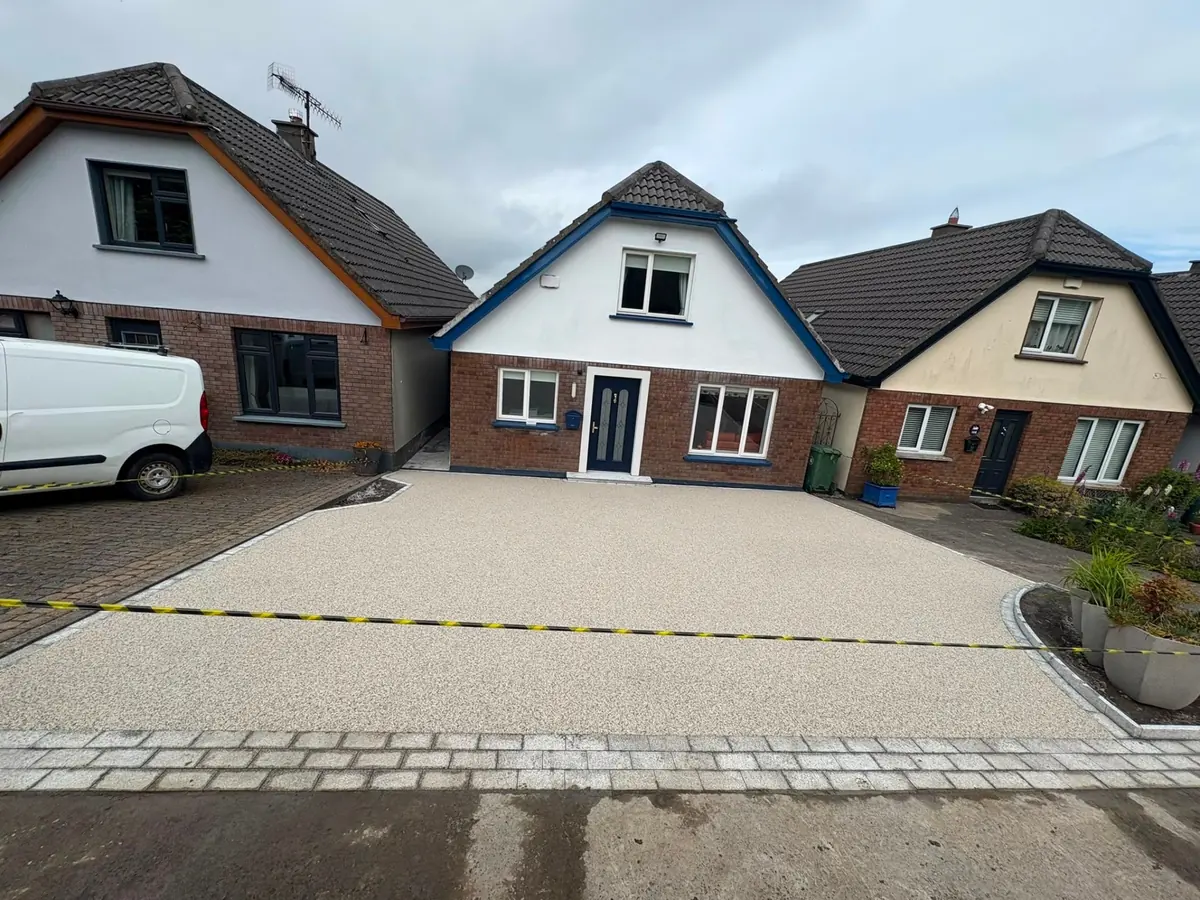 Resin-bound driveway with clean edging on a Dublin suburban home